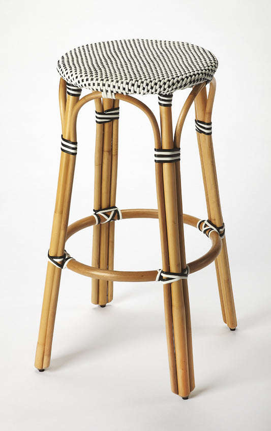 Butler Specialty Company - Tobias 30 in. Seat Height Rattan Round Backless Bar Height Stool with Footrest, Black/White Dot - 9370295