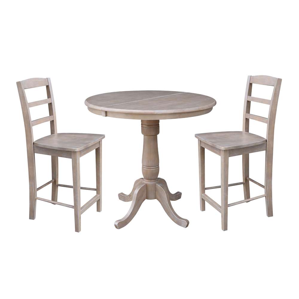 International Concepts (Set of 3 Pcs) - 36in Round Extension Dining Table with 2 Madrid Counter Height Stools in Washed Gray Taupe Finish - K09-36RXT-S402-2 veiw 1