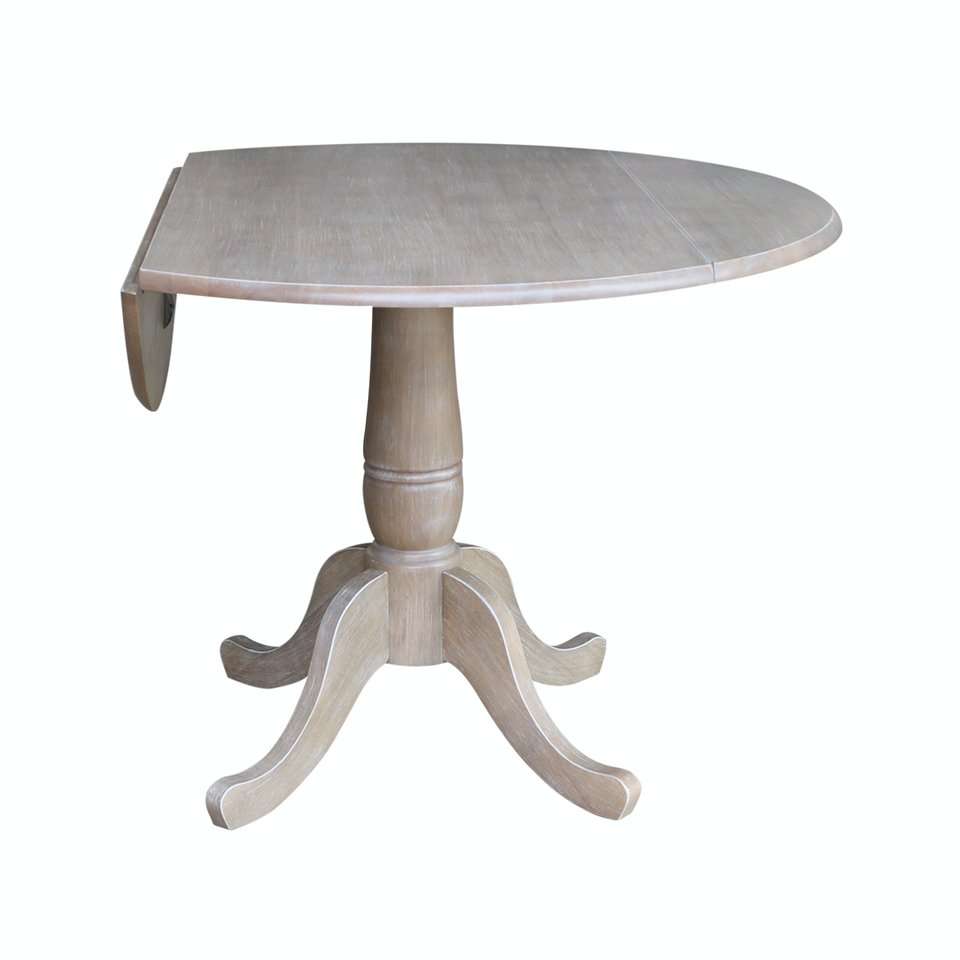 John Thomas Furniture - Dining Essentials - Round Drop Leaf Pedestal Table in Taupe Gray - T09-42DP veiw 1