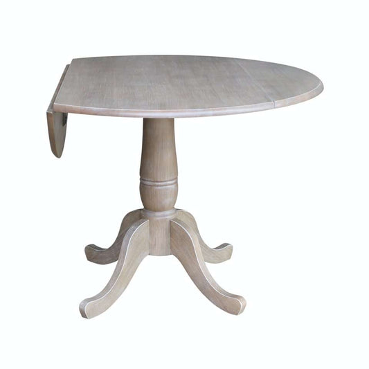 John Thomas Furniture - Dining Essentials - Round Drop Leaf Pedestal Table in Taupe Gray - T09-42DP veiw 1