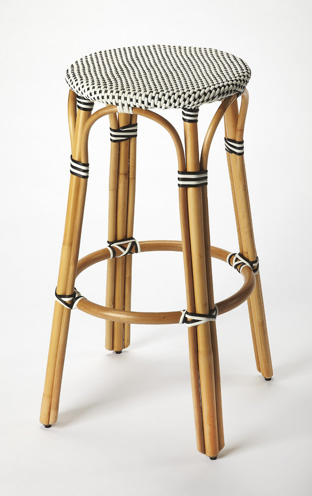 Butler Specialty Company - Tobias 30 in. Seat Height Rattan Round Backless Bar Height Stool with Footrest, Black/White Dot - 9370295