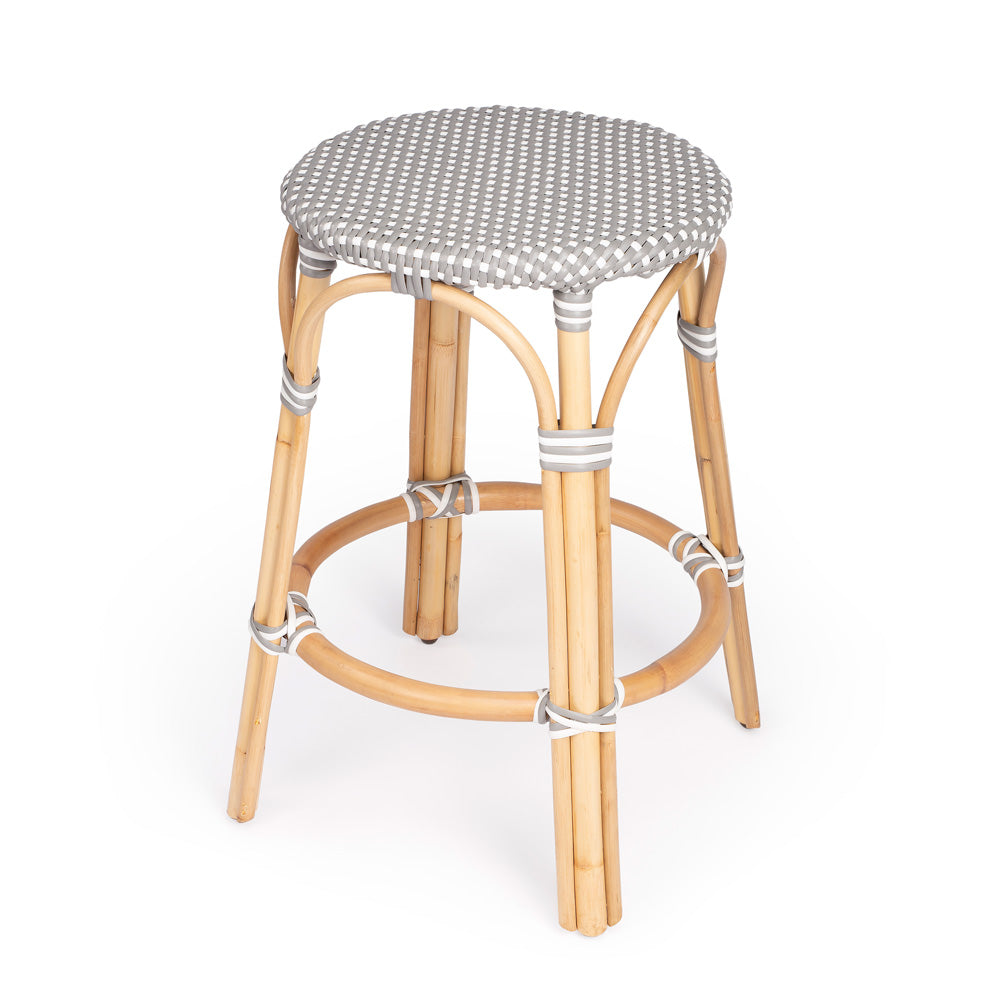 Butler Specialty Company - Tobias 24 in. Seat Height Rattan Round Backless Counter Height Stool with Footrest, Gray/White Dot - 9371266