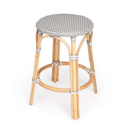 Butler Specialty Company - Tobias 24 in. Seat Height Rattan Round Backless Counter Height Stool with Footrest, Gray/White Dot - 9371266