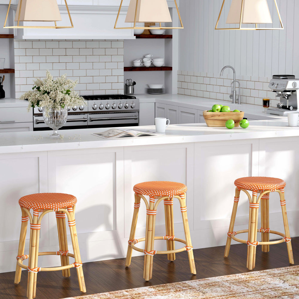 Butler Specialty Company - Tobias 24 in. Seat Height Rattan Round Backless Counter Height Stool with Footrest, Orange/White Dot - 9371427