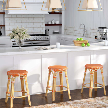 Butler Specialty Company - Tobias 24 in. Seat Height Rattan Round Backless Counter Height Stool with Footrest, Orange/White Dot - 9371427