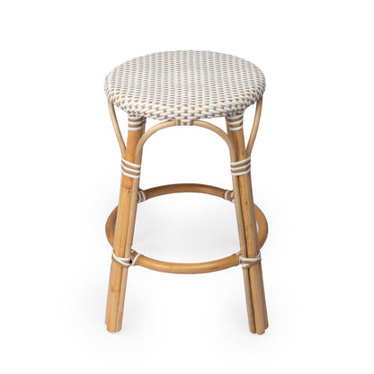 Butler Specialty Company - Tobias 24 in. Seat Height Rattan Round Backless Counter Height Stool with Footrest, Tan/White Dot - 9371415
