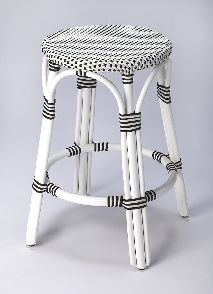 Butler Specialty Company - Tobias 24 in. Seat Height Rattan Round Backless Counter Height Stool with Footrest, White/Black Dot - 9371288