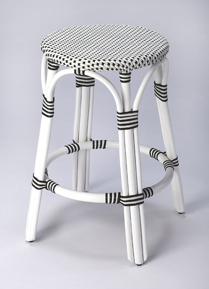 Butler Specialty Company - Tobias 24 in. Seat Height Rattan Round Backless Counter Height Stool with Footrest, White/Black Dot - 9371288