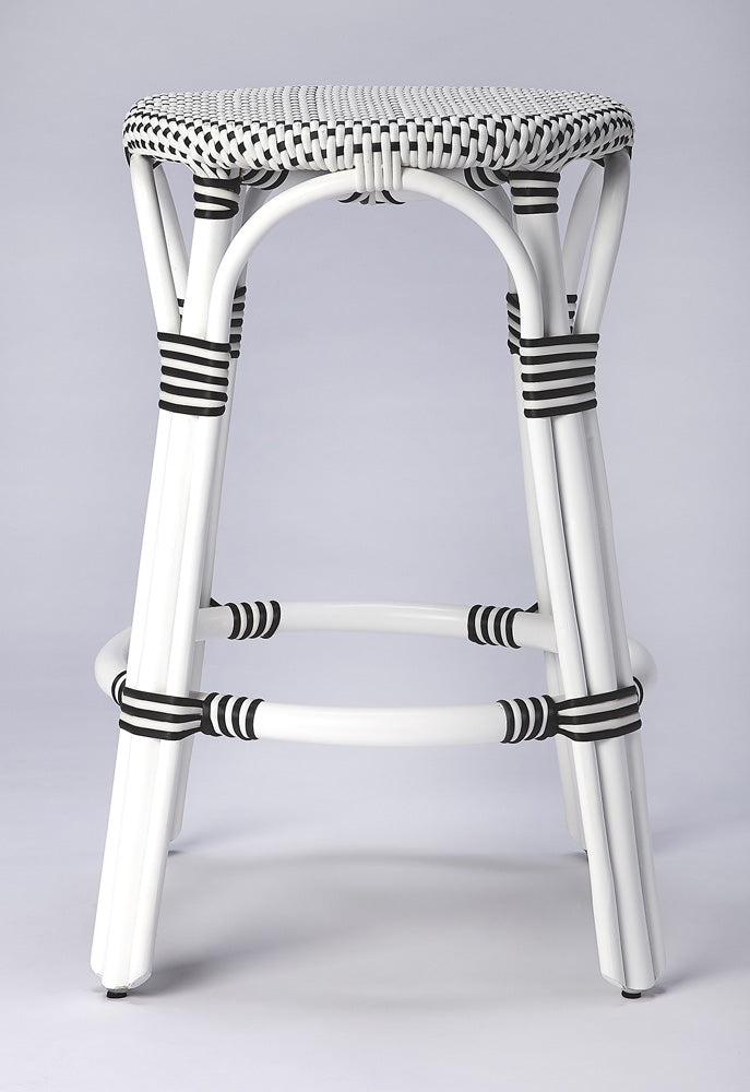 Butler Specialty Company - Tobias 24 in. Seat Height Rattan Round Backless Counter Height Stool with Footrest, White/Black Dot - 9371288