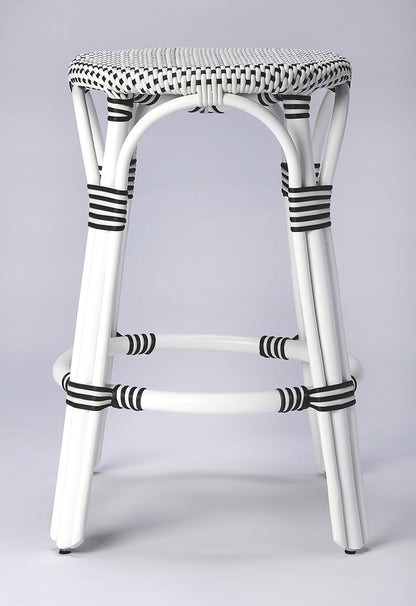 Butler Specialty Company - Tobias 24 in. Seat Height Rattan Round Backless Counter Height Stool with Footrest, White/Black Dot - 9371288