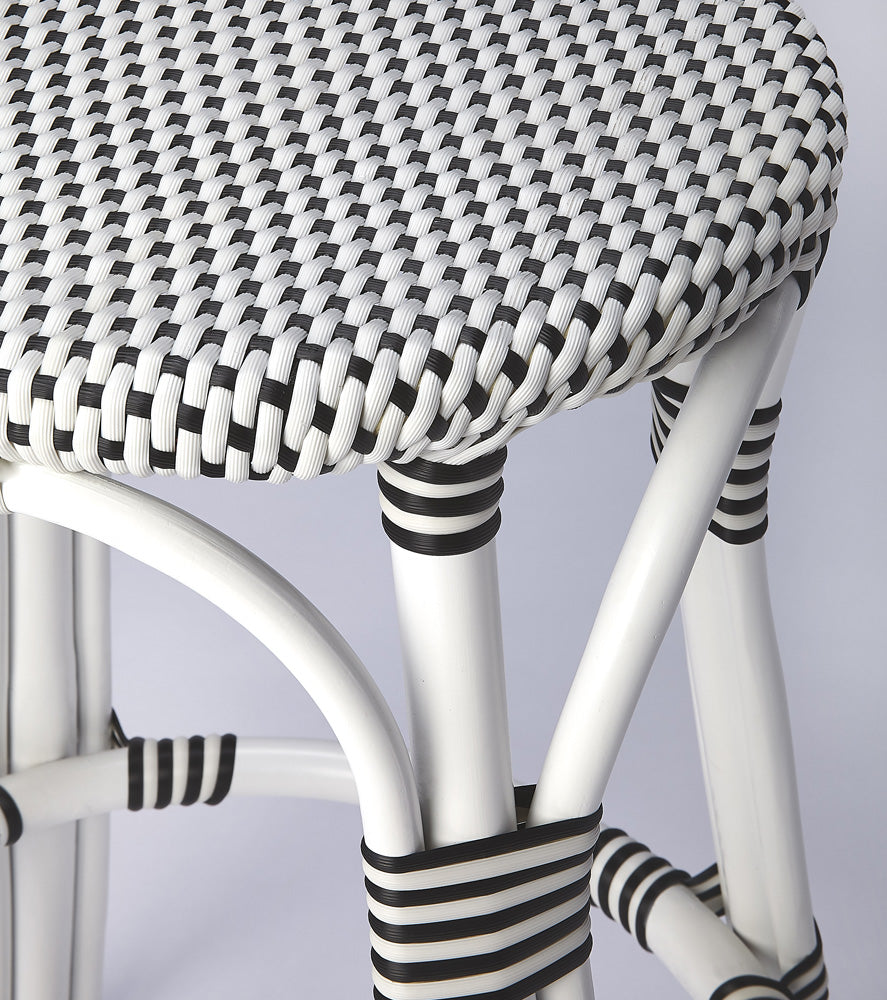 Butler Specialty Company - Tobias 24 in. Seat Height Rattan Round Backless Counter Height Stool with Footrest, White/Black Dot - 9371288