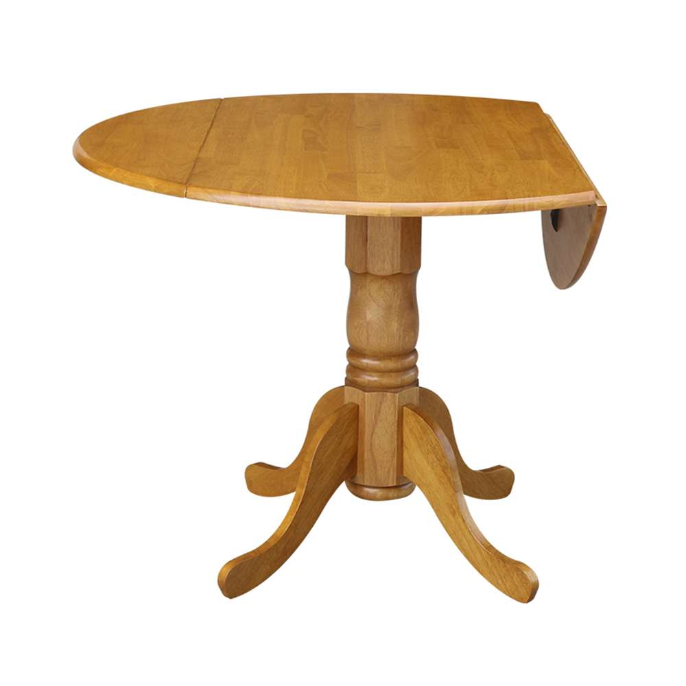 International Concepts - 42in Round Dual Drop Leaf Ped Table in Oak Finish - T04-42DP view 2