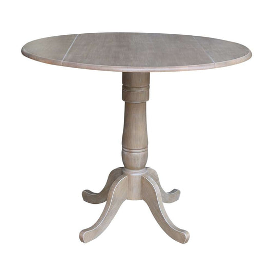 International Concepts - 42in Round Dual Drop Leaf Ped Table - 35.5inH in Washed Gray Taupe Finish - K09-42DPT-6B veiw 1