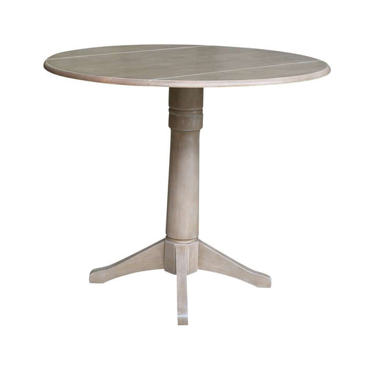 International Concepts - 42in Round Dual Drop Leaf Ped Table - 36.3inH in Washed Gray Taupe Finish - K09-42DPT-27B-6B veiw 1