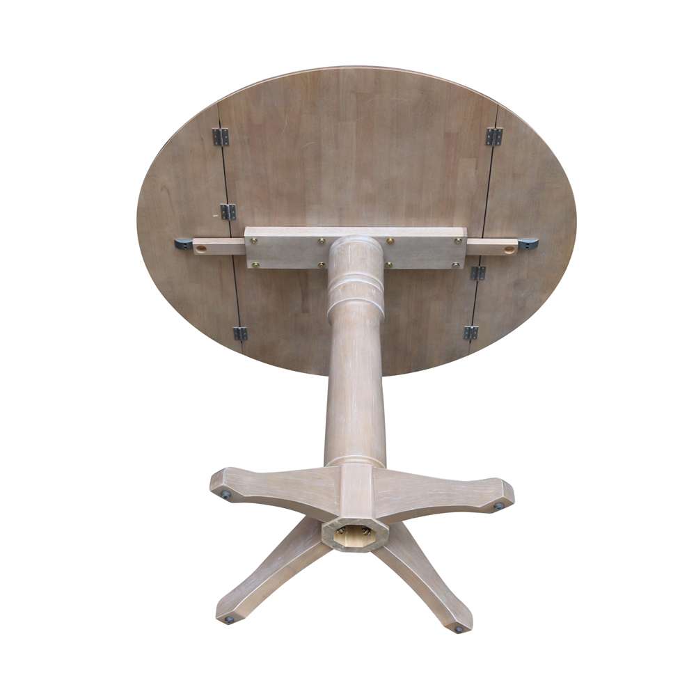 International Concepts - 42in Round Dual Drop Leaf Ped Table - 36.3inH in Washed Gray Taupe Finish - K09-42DPT-27B-6B veiw 3