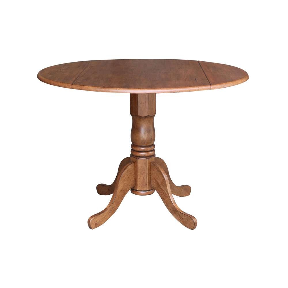 International Concepts - 42in Round Dual Drop Leaf Ped Table in Distressed Oak Finish - T42-42DP veiw 1