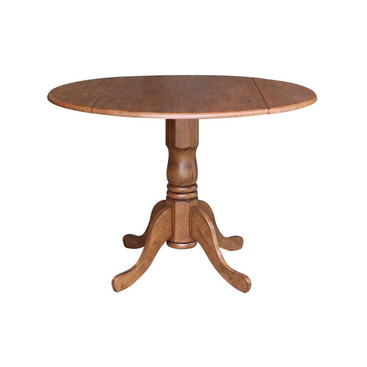 International Concepts - 42in Round Dual Drop Leaf Ped Table in Distressed Oak Finish - T42-42DP veiw 1