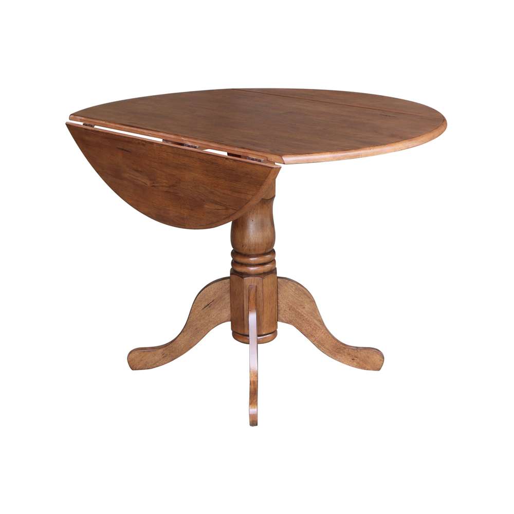 International Concepts - 42in Round Dual Drop Leaf Ped Table in Distressed Oak Finish - T42-42DP veiw 2