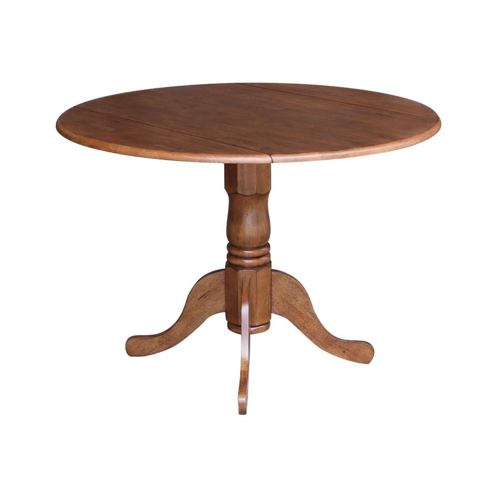 International Concepts - 42in Round Dual Drop Leaf Ped Table in Distressed Oak Finish - T42-42DP veiw 4