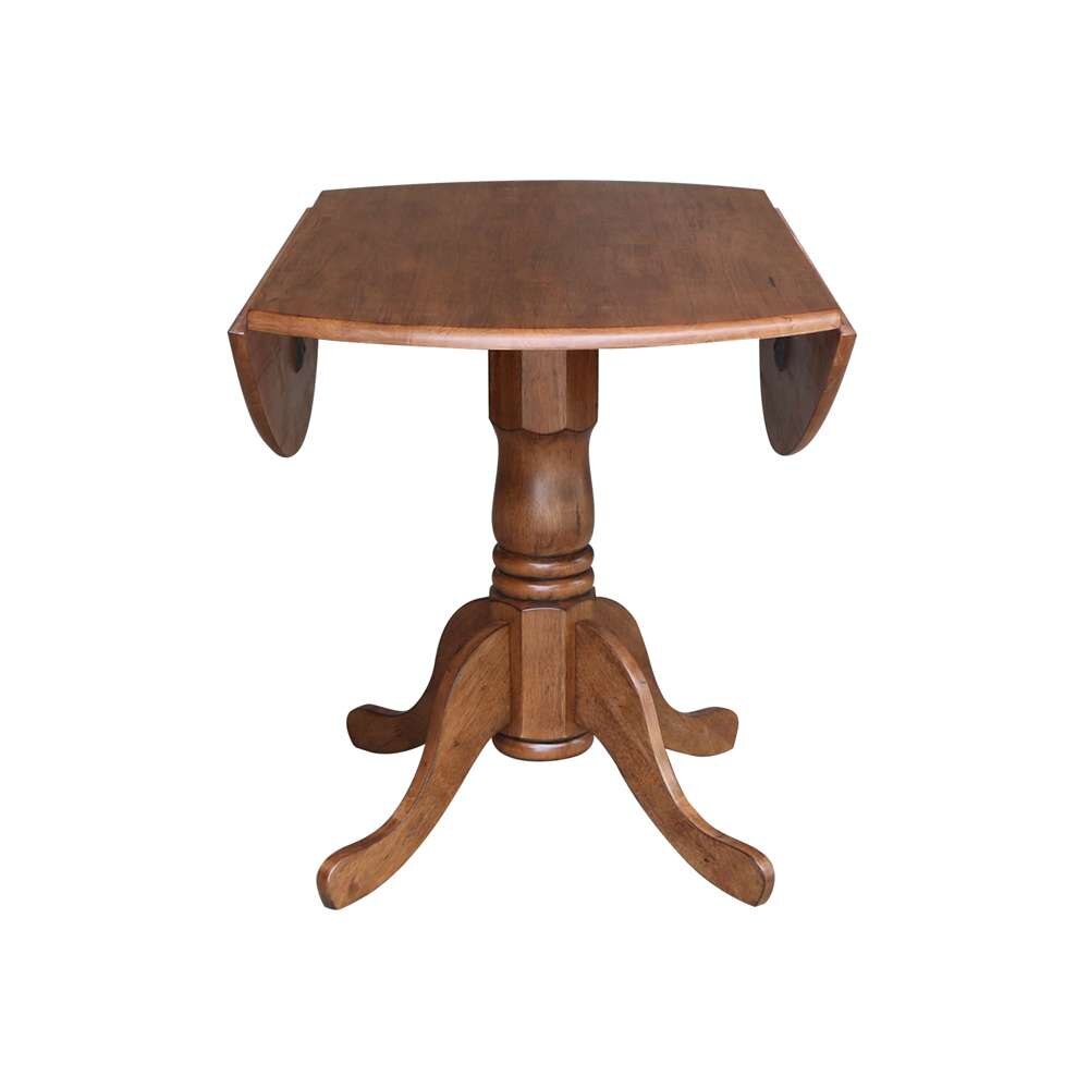 International Concepts - 42in Round Dual Drop Leaf Ped Table in Distressed Oak Finish - T42-42DP veiw 5