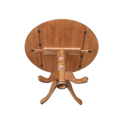 International Concepts - 42in Round Dual Drop Leaf Ped Table in Distressed Oak Finish - T42-42DP veiw 6