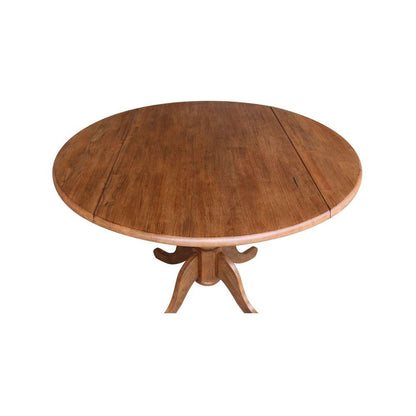 International Concepts - 42in Round Dual Drop Leaf Ped Table in Distressed Oak Finish - T42-42DP veiw 7