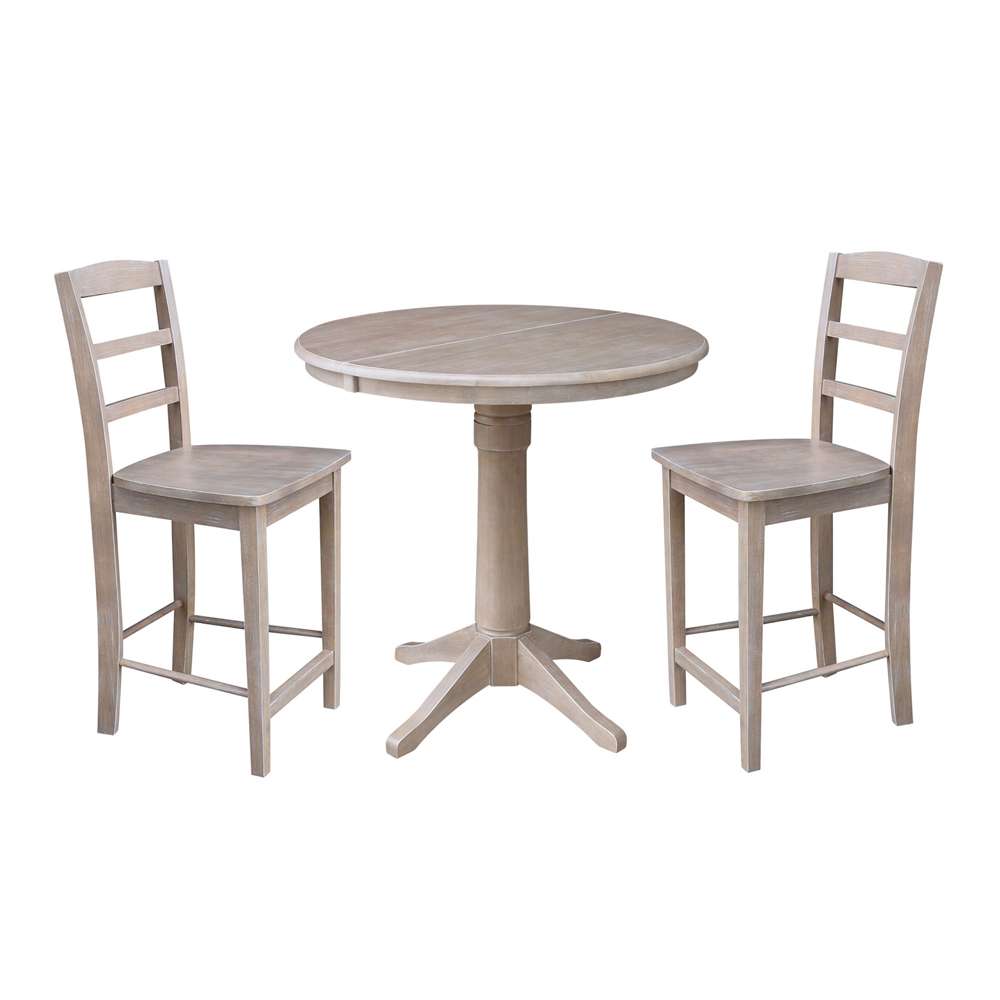 International Concepts (Set of 3 Pcs) - 36in Round Extension Dining Table with 2 Madrid Counter Height Stools in Washed Gray Taupe Finish - K09-36RXT-27B-S402-2 veiw 1