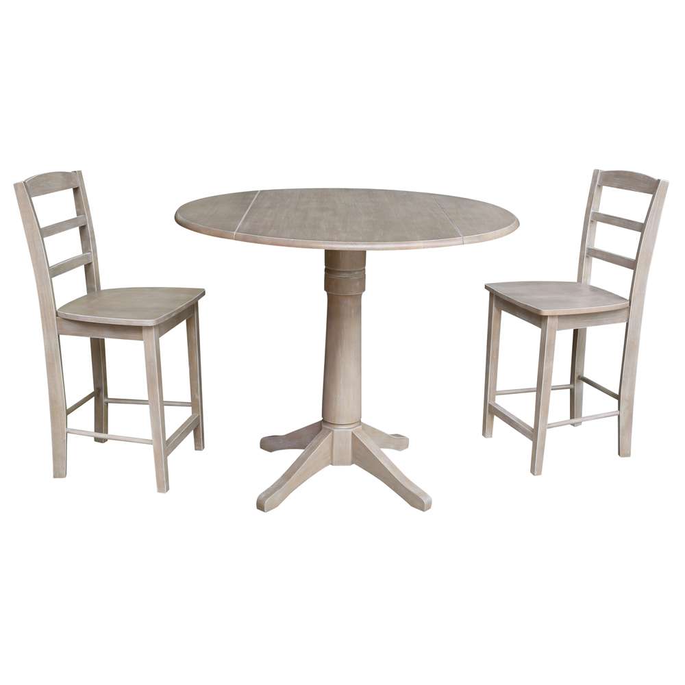 International Concepts (Set of 3 Pcs) - 42in Round Pedestal Gathering Height Table with 2 RTA Counter Height Stools in Washed Gray Taupe Finish - K09-42DPT-27B-S402-2 veiw 1