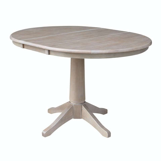 John Thomas Furniture - Dining Essentials - 36in Extension Table Top w/30inH Transitional Pedestal in Taupe Gray - T09-36RXT_T09-27B veiw 1