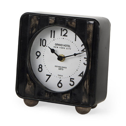 Mercana - Karl 6.0L x 3.0W x 6.8H Rustic Black Iron Rounded Square Table Clock - 69487 view 1