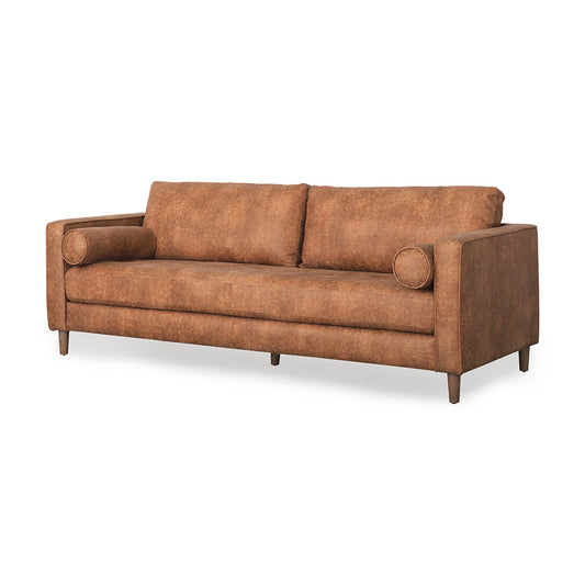 Mercana - Loretta 88.0L x 36.2W x 33.9H Cognac Brown Faux Leather Three Seater Sofa with Two Bolster Cushions - 69624 view 1