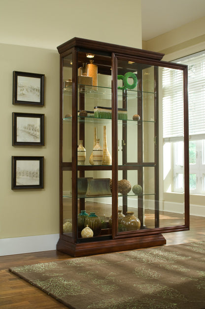 Pulaski - Curios Cherry Brown Lighted Sliding Door 4 Shelf Curio Cabinet - 20542 view 4